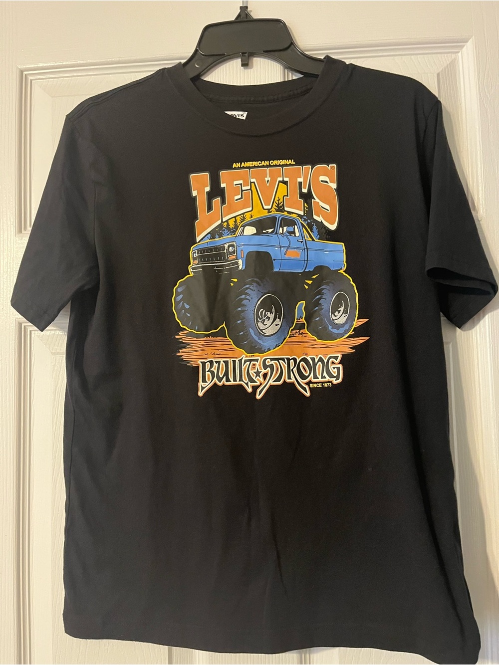 Levi's Black Tee with Blue Monster Truck Graphic